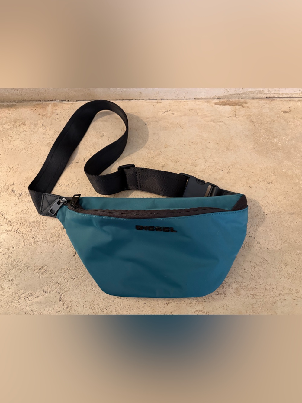 Diesel teal sling belt bag with black strap